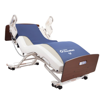A Joerns PrevaMatt foam mattress on a Joerns bed, with the cover cut away to show the foam
