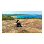 XT4 on a rocky headland above the sea