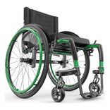 Motion Composites APEX C with Monster Green color accents and matching Air Grip handrims, front three quarter view