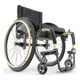 Motion Composites APEX C with Desert Sand color accents and matching Air Grip handrims, front three quarter view