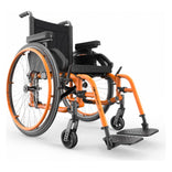 Motion Composites Helio A7 in Sunkissed Orange with matching Air Grip handrims, front three quarter view