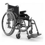 Motion Composites Helio A7 in Charcoal with matching Air Grip handrims, front three quarter view