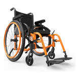 Motion Composites Helio A6 in Sunkissed Orange with matching Air Grip handrims, front three quarter view