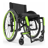 Motion Composites Veloce in High Gloss Carbon Fiber with Acid Green highlights and matching Air Grip handrims, front three quarter view