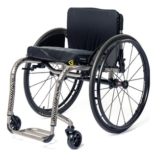 TiLite ZR titanium rigid wheelchair in satin titanium with a tattoo on the front frame tubes, front three-quarter view