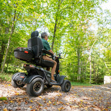 Pride Baja Wrangler 2 off-road mobility scooter outdoors, lifestyle scene