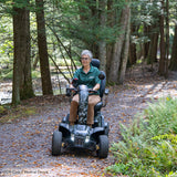 Pride Baja Wrangler 2 off-road mobility scooter outdoors, lifestyle scene