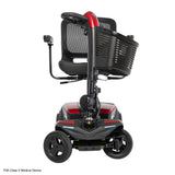 Pride Go Go Endurance AL+ 4-Wheel mobility scooter in Garnet Red, front wheels turned to show the tight turning radius