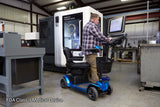 Pride Revo 2.0 4-Wheel mobility scooter outdoors, lifestyle scene
