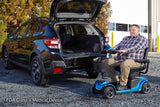 Pride Revo 2.0 4-Wheel mobility scooter outdoors, lifestyle scene