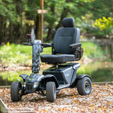 Pride Baja Wrangler 2 off-road mobility scooter outdoors, lifestyle scene