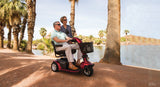 Pride Victory 10 3-Wheel at a lakeside, lifestyle scene