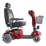 Merits Pioneer 9 side view showing the captain seat, tiller and rear drive wheels