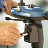 Close-up of the So Lite charging port with the charger plugged in