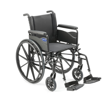 Invacare 9000 XT wheelchair, front three-quarter view with full-length arms and swing-away footrests