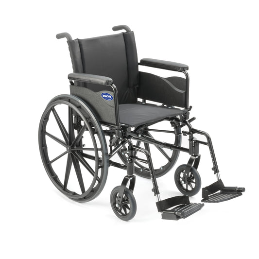 Invacare 9000 XT wheelchair, front three-quarter view with full-length arms and swing-away footrests