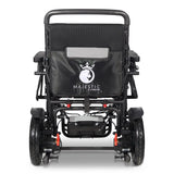 ComfyGo Majestic 440 HD Plus from directly behind, showing the push handles and the backrest pouch