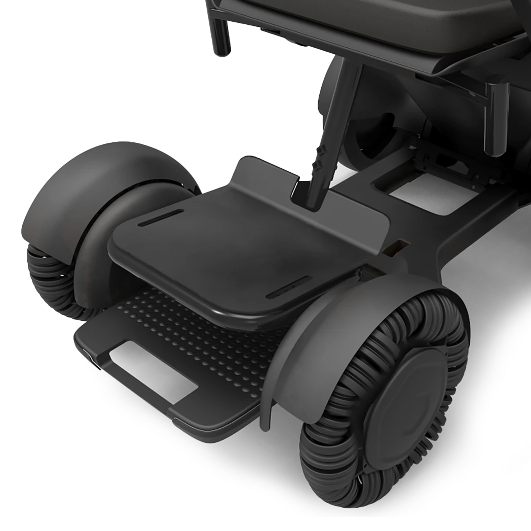 WHILL height adjustable foot support fitted to a Model C2 power wheelchair