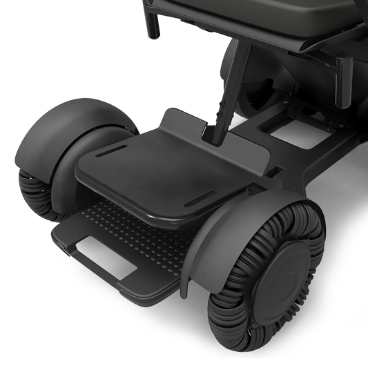 WHILL height adjustable foot support fitted to a Model C2 power wheelchair