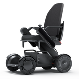 WHILL Model C2 High Back power wheelchair with a black arm cover, three-quarter view