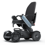 WHILL Model C2 High Back power wheelchair with a blue arm cover, three-quarter view