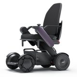 WHILL Model C2 High Back power wheelchair with a plum arm cover, three-quarter view