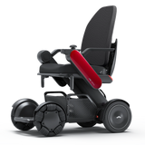 WHILL Model C2 High Back power wheelchair with a red arm cover, three-quarter view