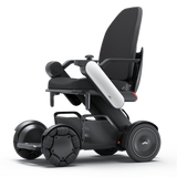 WHILL Model C2 High Back power wheelchair with a white arm cover, three-quarter view