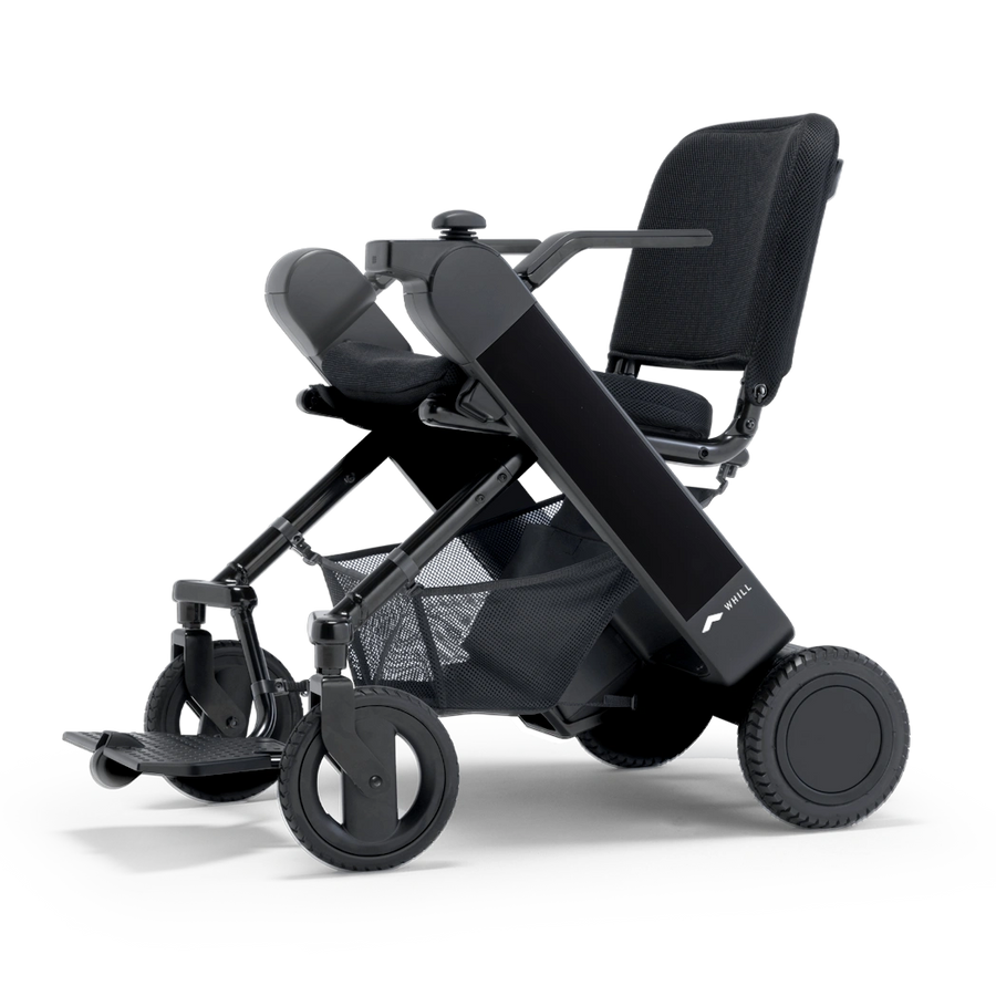WHILL Model F folding power wheelchair with a black arm cover, three-quarter view