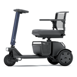 WHILL Model R 3-Wheel mobility scooter with a blue tiller cover, side view
