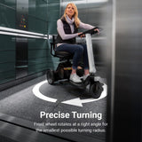 The WHILL Model R 3-Wheel turning in a tight space