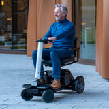 A rider on a WHILL Model R 4-Wheel