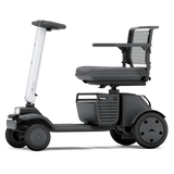 WHILL Model R 4-Wheel mobility scooter with a white tiller cover, side view
