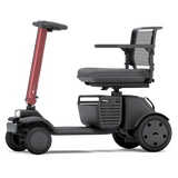 WHILL Model R 4-Wheel mobility scooter with a red tiller cover, side view