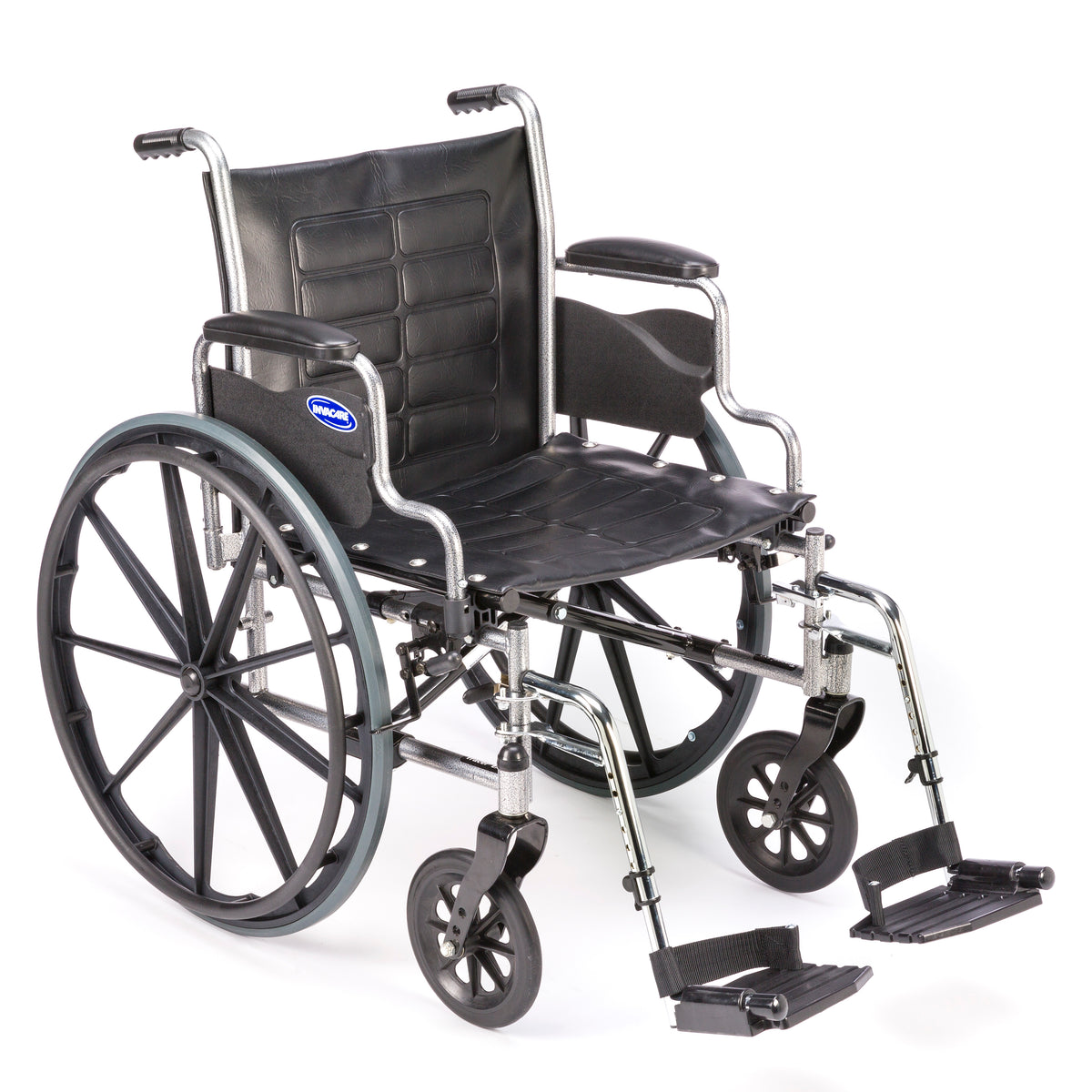 Invacare Tracer EX2 wheelchair, front three-quarter view with full-length arms and swing-away footrests