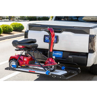 Harmar AL301XL Fusion installed on a vehicle with a scooter secured on the platform