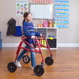 A girl walking indoors with a red Klip on 8" front wheels