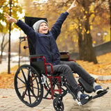 A boy in a red Ziggo Pro outdoors in a park