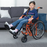 A girl seated in an orange Ziggo in a living room