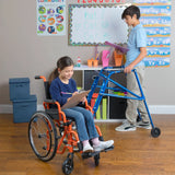 A girl in an orange Ziggo in a classroom