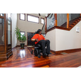 Pride Jazzy EVO 613 power wheelchair in a home entryway