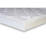 A corner of the Flexabed low profile mattress cut away to show the quilted top over its foam core