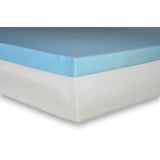 A corner of a Flexabed memory foam mattress with the cover off, showing the blue memory foam layer on its foam core