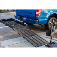 Harmar AL001 Universal Manual Carrier fitted to a pickup with the ramp down