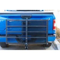 Harmar AL001 Universal Manual Carrier fitted to a pickup with the platform folded