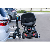A scooter secured on the platform of a Harmar AL100HD lift