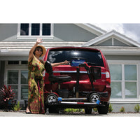The Harmar AL300 Fusion platform lifting a scooter behind a vehicle