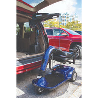 A scooter secured to the Harmar AL435 lift beside a vehicle