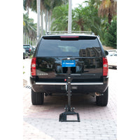 Harmar AL580 power wheelchair lift installed on the back of a vehicle