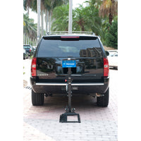Harmar AL580XL power wheelchair lift installed on the back of a vehicle